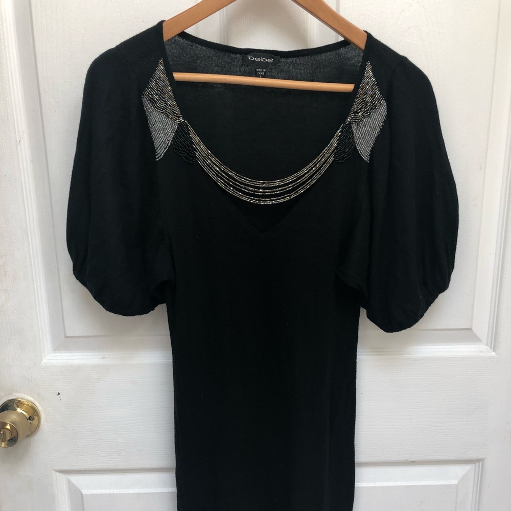 Black BEBE sweater dress with chain neck detail